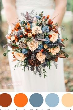 a bride holding a bouquet with orange and blue flowers