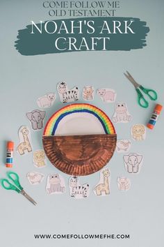 a paper plate with noah's ark on it surrounded by scissors and crayons