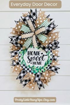 a wreath with the words, everyday door decor on it