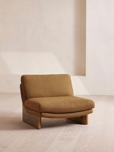 a chair sitting on top of a hard wood floor