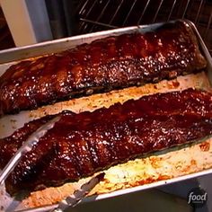 two ribs are being cooked in an oven