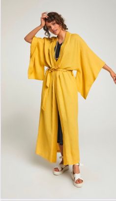 Special design oversize pure Italian linen kimono Simple and beautiful SPECIFICATION * Fabric: 100 % Linen * Color : mustard yellow, natural brown * Size : This Kimono is standard size perfectly suits all sizes. Small, Medium, Large, xlarge it fits all sizes in a perfect way. Bust: 52 inches/132 cm Length: 56 inches/142 cm CARE INSTRUCTION * Machine Wash Warm and Seperately * Do Not Tumble Dry * Iron inside out and Warm * Do Not Bleach The link for a beautiful gift box is below; https://www.etsy Yellow Wrap Kimono For Spring, Long Yellow Robe For Spring, Linen Wrap Robe For The Beach, Linen Wrap Robe For Beach, Beige Linen Kimono For Beach, Linen Wrap Kimono For Vacation, Beige Linen Beach Kimono, Linen Kimono With Kimono Sleeves For Loungewear, Vacation Linen Wrap Kimono