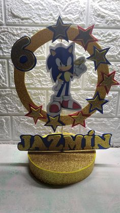 sonic the hedgehog trophy with stars around it