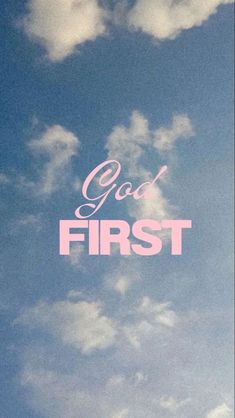 the words god first against a blue sky with white clouds in the foreground and pink lettering