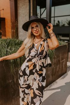 - Kick back and enjoy some vacay vibes in this stylish jumpsuit! - Unlined material with an abstract floral print - A v-cut neckline with a twist detail - Adjustable spaghetti straps - A smocked upper back with a tie detail - A wide legged jumpsuit with floor length hemlines Wide Legged Jumpsuit, Vacay Vibes, Stylish Jumpsuit, Black Curves, Abstract Floral Print, Floral Jumpsuit, V Cut, V Cuts, Wide Leg Jumpsuit