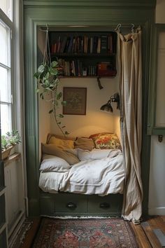 a bedroom with a bed and bookshelf next to a window in the corner