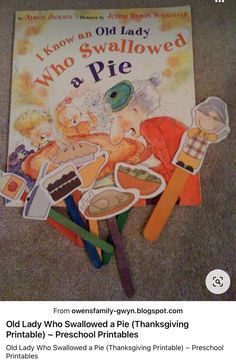 an old lady who swallowed a pie thanksgiving printables are on the floor next to a book