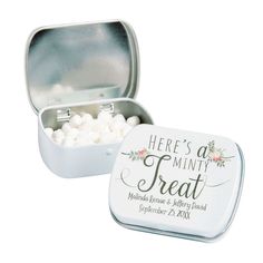 there's a minty treat tin with white marshmallows in it