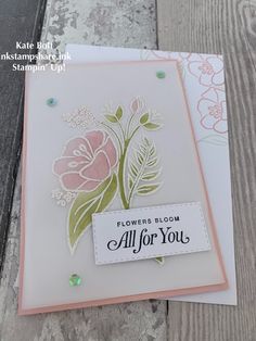 a close up of a card with flowers on it