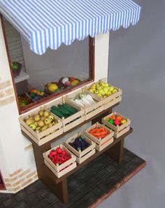 an outdoor stand with fruits and vegetables for sale