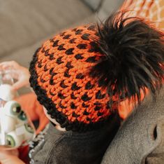 Inspired by the spookiest city in Massachusetts , The Salem beanie is perfect for every Halloween loving ghoul and goblin.  Each Salem beanie is orange with black fair isle patterning and adorned with a leather rage and black faux fur pom.  * Available in toddler, child, and adult sizing!  KNIT CARE  Handwash only, lay flat to dry. STAY IN TOUCH  Instagram --  @SLynchKnitwear  **PLEASE ALLOW UP TO 10 DAYS FOR YOUR PRODUCT TO BE MADE AND PREPARED TO BE SHIPPED** If you have any questions, please contact me via Etsy Convo or slynchknitwear@yahoo.com Halloween Beanie One Size Fits Most, Halloween Beanie, Salem Halloween, Knit Coaster, Basic Witch, Halloween Candy Corn, Fair Isle Pattern, Black Faux Fur, Pom Beanie