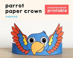 a paper crown with an image of a blue bird on it's head and the words parrot paper crown colored