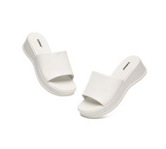 EVERAU® Women Leather Platform Wedge Slides Fiona #EA7037 Description: Introducing the EVERAU Fiona Platform Slides, a perfect blend of style and comfort. These sandals feature a strap made from high-quality leather for a luxurious, soft texture. As well as a contoured footbed to ensure ultimate comfort and support. The chic wedge and unique round-toe design will become a versatile choice for upcoming occasions.  Specification: Brand: EVERAU A combination of style and comfort. The strap is made from the finest top-grain leather to bring you the softest texture. The material of lining is skin-friendly and comfortable. The foam outsole is breathable and has an extra cushion. The contoured footbed fits your foot shape perfectly providing ultra comfort. The summer sandals' special pattern is d Kids Ugg Slippers, Wedge Slides, Mens Ugg Slippers, Kids Ugg Boots, Summer Slides, Ugg Boots Men, Sandal Slides, Ugg Outlet, Ugg Slippers Women