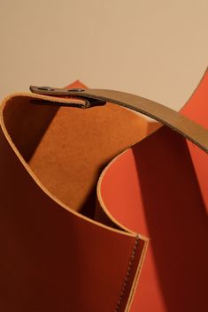 Free USA shipping. 15-30 USD international shipping. All work is made to order. Please allow 5-7 days for me to cut and sew your pieces. Thick, firm, smooth papaya orange leather bag. Modern and gorgeous. Specifications Simple unlined shoulder bag in bright papaya orange leather. Brown leather strap, medium length, finished with double screws and an interior keyring. Suede texture on strap interior keeps bag on your shoulder. Approximate measurements: 10in = 10"w x 22" overall drop 13in = 13"w x Modern Orange Leather Shoulder Bag, Modern Orange Bucket Bag, Modern Orange Bucket Shoulder Bag, Orange Leather Bucket Bag For Travel, Orange Rectangular Bag With Leather Lining, Daily Use Orange Shoulder Bag With Leather Lining, Orange Shoulder Bag With Leather Lining For Daily Use, Orange Leather Bucket Bag For Shopping, Orange Leather Lined Shoulder Bag For Daily Use