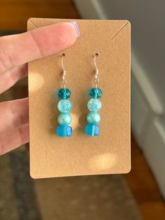 Handmade Blue Glass Dangly Earrings, Dangly Earrings, Glass Earrings, Hand Crafted Jewelry, Homemade Jewelry, Mamma Mia Earrings Jewelry Homemade, Fun Trips, Crafted Earrings, Homemade Earrings, Unique Meaning, Blue Girl, Beaded Earrings Diy, Homemade Jewelry, Hand Crafted Jewelry