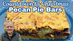 a man standing in front of a blue plate with food on it and the words, countdown to christmas pecan pie bars