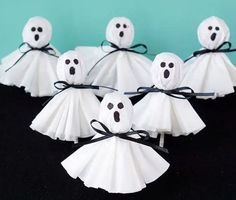 these paper ghost decorations are easy to make and look like they're ready for halloween