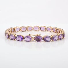 This is a classic-style tennis bracelet. A must-have statement piece for every woman. It's a classic luxury to have.-Material - 14K Solid Yellow Gold-Gemstone - Genuine Amethyst -Gross weight - 16.75 grams-Gemstone Weight - 28.190 CtThe bracelet length can be adjusted to your wrist size, on request.Amethyst Benefits :-         enhancing the immune system.    improving endocrine function.    improving the skin's appearance.    promoting digestive health.    reducing headaches.    regulating hormo Amethyst Benefits, Regulating Hormones, Vintage Charm Bracelet, Bracelet Minimalist, Gold Armband, Amethyst Gold, Birthstone Bracelet, Moonstone Bracelet, Birthstone Pendant