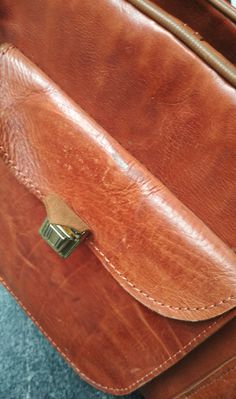 "Welcome! Amazing Leather Bag In Very good condition. Only small signs of use and small stain in the base of bag! One compartment outside Dimensions: - Tall: 10.23\" (26 cm) - Deep: 10.23\" (26 cm) - W: 19.29\" (49 cm) - Handles: 23.62\" (60 cm) Thanks for stopping by!!IMPORTANT: Due to the delicate situation We're all going through, and in order to keep the safety of courier workers too, all orders will be dispatched when alert sanitary finished. You can purchased or reserve items like always. Brown Leather-lined Pouch Satchel, Vintage Brown Top Handle Saddle Bag, Formal Brown Saddle Bag With Leather Handles, Classic Brown Pouch Saddle Bag, Vintage Cognac Briefcase For Everyday, Classic Brown Saddle Bag Pouch, Vintage Cognac Briefcase, Formal Cognac Saddle Shoulder Bag, Cognac Saddle Shaped Satchel For Daily Use