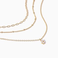 Our Flower Pendant Necklace is all you need for a full layered necklace look. This three-in-one necklace features three dainty chains and a flower pendant that’s perfect for all your spring and summer looks. Delicate Multi-strand Layered Necklaces, Delicate Layered Chain Necklace For Layering, Delicate Layered Chain Necklace, Uncommon James, Three In One, Layered Chain, Layered Chains, Flower Pendant Necklace, Gold Flower