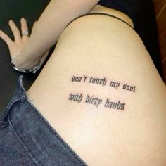 a woman with a tattoo saying, don't touch my soul until dirty hands