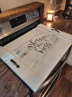 an old kitchen stove with the words happy thanksgiving written on it