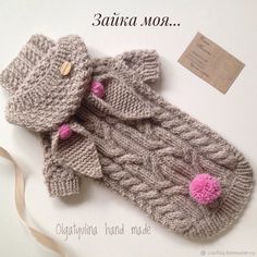 the knitted mittens and gloves are ready to be put into the baby's diaper