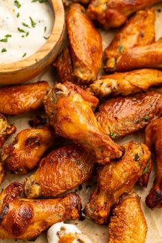 chicken wings with ranch dressing on the side, ready to be eaten and served for consumption