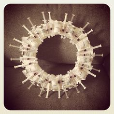 an arrangement of toothbrushes arranged in the shape of a circle on a chair