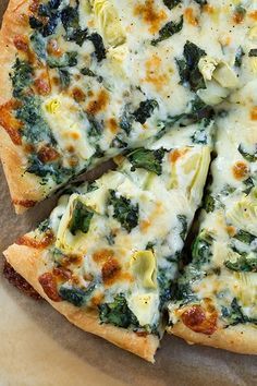 the best spinach - artichoke pizza is shown in this cookbook cover