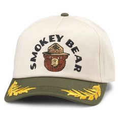 the smokey bear hat is white and green