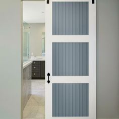 an open white door with grey slats on it