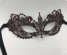 Elegant Theater Masks For Halloween, Red Masquerade Mask For Mardi Gras Party, Red Party Masks For Mardi Gras, Red Eye Mask For Party, Red Eye Masks For Party, Red Venetian Masquerade Mask, Red Venetian Mask For Masquerade, Red Masquerade Mask For Halloween Party, Venetian Red Masquerade Mask For Party