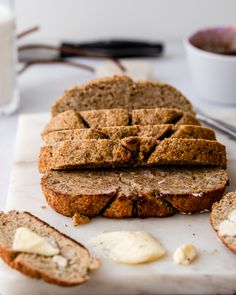 slices of bread with butter on a cutting board