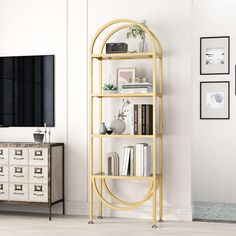 PRICES MAY VARY. The gold bookshelf freestanding is a beautiful ladder bookcase made of metal and glass panels. It has a sturdy modern design with high durability. The 4 tier ladder bookshelf can be used as a plant stand, bookcase, bathroom cabinet, storage organizer in your living room, bedroom, kitchen, balcony, office, corridor, or any other space. Modern gold bookcase allows it to match fashion with function giving you ample space to store or display your favorite photographs, keepsakes, boo Gold Bookcase, Bookshelf For Small Spaces, Gold Bookshelf, Gold Storage, Ladder Bookshelf, Bookcase Organization, Corner Bookshelves, Shelves Storage, Modern Bookcase