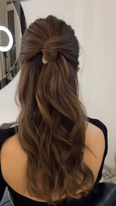 Adding a little extra flavor to your half-up half-down look ✨ If you try this look, post it on Instagram and tag us and we will share our… | Instagram Half Up Half Down Hairstyle Bridesmaid, Ball Hairstyles Half Up Half Down, Blowout Half Up Half Down Hairstyles, Slicked Half Up Half Down Ponytail, Business Half Up Half Down Hair, Bouncy Curls Half Up Half Down, Blowout Curls Half Up Half Down, Half Up Half Down Soft Curls, Half Ponytail Wedding Hair