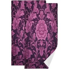 two purple and pink floral curtains with white trims on the bottom one has a large flower