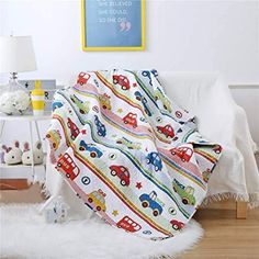 a child's bed with a blanket on it