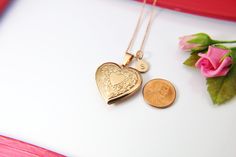 This is a rose gold-tone stainless steel locket charm with hand-stamped initial charm on Rose Gold over a stainless steel chain 18 inches. (Hypoallergenic) Tarnish Resistant! Top Quality, Happiness Guarantee! ♥ You will receive 1 necklace ♥ 304 Stainless Steel Locket Pendants, Photo Frame Charms, Heart, Rose Gold, 29x29x6.5mm, inner diameter: 20x21mm ♥ Initial Disc Stainless Steel Charms, Flat Round, 8-10mm. ♥ Stainless Steel cian 18 inches **conversion : 1 inch = 25.4mm or 1mm = 0.0393 inch** ♥ Gold Nickel-free Locket Necklace For Wedding, Gold Wedding Locket Necklace Nickel Free, Personalized Gold Locket Necklace For Anniversary, Gold Locket Necklace With Initial Pendant For Personalized Gift, Personalized Yellow Gold Brass Locket Necklace, Personalized Brass Locket Necklace For Wedding, Valentine's Day Gold Locket Necklace Nickel Free, Personalized Gold Brass Locket Necklace, Engraved Rose Gold Locket Necklace For Anniversary