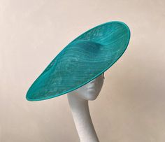 Sophisticated extra large saucer headpiece, with its bold colour and simple design it will add drama and elegance to your outfit.  Can be made in your own colour - email me rubybosebridal@gmail.com Made from high quality sinamay, hand blocked and dyed in the UK with traditional millinery methods.  This effortless disc really makes a statement for the Derby or to add some drama for that special occasion  Attached to satin covered double headbands and comb, in a choice of blonde, brunette, black or auburn to blend with your hair colour. Meets Royal Ascot, Royal Enclosure requirements The piece is approx 45cm in diam. Each piece is handmade by me for you, using the highest quality materials which takes about 5 days. If you have a specific date you need the headpiece please get in touch and I Luxury Headband For Kentucky Derby Races, High Tea Dress, Royal Outfit, Double Headband, Large Hat, Ascot Hats, Hat Wedding, Star Headband, Wedding Hat