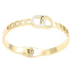 Enhance your accessory collection with our Stainless Steel Metal Hinged Bracelet, a sleek and modern piece designed to add a touch of sophistication to any outfit. Crafted from durable stainless steel, this bracelet combines elegance with functionality.Key Features:- Material: Made from high-quality stainless steel for durability and a polished finish- Color: Elegant gold, perfect for adding a touch of luxury to your look- Design: Features a metal hinge closure for a secure fit and a sleek, contemporary style- Size: Adjustable to fit a range of wrist sizes for comfort and versatilityProduct Details:- Elegant and Durable: The stainless steel construction ensures lasting wear and a refined look- Quality Craftsmanship: Expertly crafted with attention to detail for a sophisticated finish- Care Bracelet Stands, Hinged Bracelet, Business Meeting, Formal Outfit, Steel Metal, Steel Construction, Stainless Steel Bracelet, Bracelet Set, Hinges