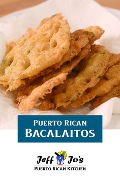 some fried food is in a white bowl on a table with the words puerto rican bacalatos