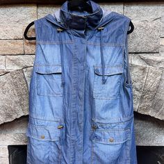 Brand Denim Vest. Four Pockets. Two Drawstring Cords - One For The Hood And One For The Waist. Spring Medium Wash Outerwear For Outdoor, Denim Blue Outerwear For Spring Outdoor, Spring Denim Blue Outerwear For Outdoor, Spring Washed Blue Hooded Outerwear, Casual Denim Vest With Pockets For Outdoor, Casual Spring Denim Jacket For Outdoor, Hooded Vest, Denim Vest, Jackets For Women