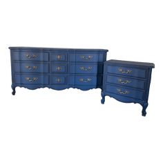 two blue dressers sitting next to each other