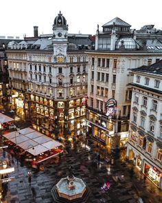 an aerial view of a city square at night