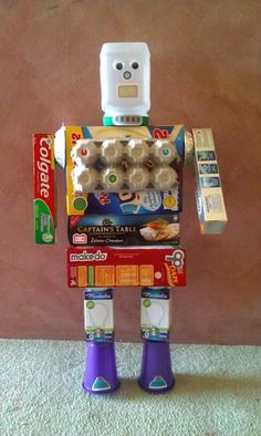 a toy robot made out of cereal boxes