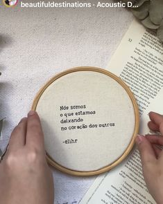 someone is working on a cross - stitch project with the words'no sonos e que estamos de la alexandria, do not so sesa do outro '