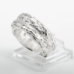 This "Fiji" silver ring is handmade in Fine Silver (99.9% pure silver). This unique piece is entirely molded by hand, using the silver clay technique. The style of this ring is inspired by the beauty of the most amazing coral reefs in the world. Ring size: 7.25 (This is a unique creation. Only one size available. I cannot adjust the ring size.) What is Fine Silver? Fine Silver, also called Precious Metal Clay or Silver Clay, is a malleable material composed of microscopic particles of pure silver. It is made from silver that is recycled from a range of sources, including waste from x-rays and the photographic industry. It can be worked like traditional clay using the hands, or else molded. The molded piece is then heated to merge the fine silver particles together. The result is a 99.9% pu X Rays, Silver Clay, Fine Silver Jewelry, Precious Metal Clay, Coral Reefs, Metal Clay, Precious Metal, Coral Reef, Pure Silver