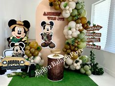 mickey mouse balloon arch with balloons and decorations