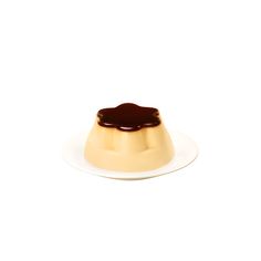 a white plate topped with a cake covered in chocolate icing on top of it